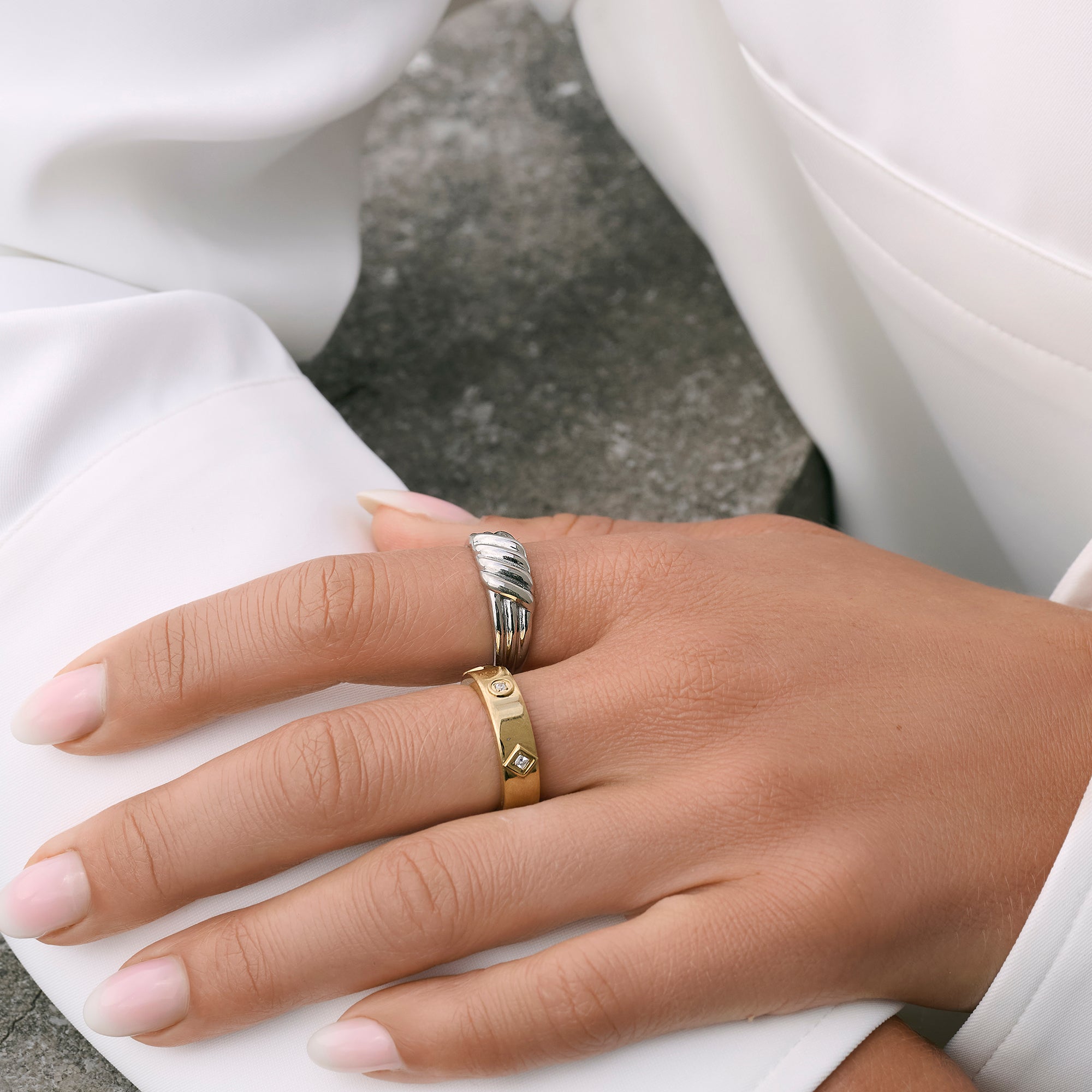 Two-tone stainless steel rings for women, gold and silver modern statement rings with cubic zirconia accents, hypoallergenic non-tarnish jewelry for sensitive skin, elegant everyday fashion rings.

