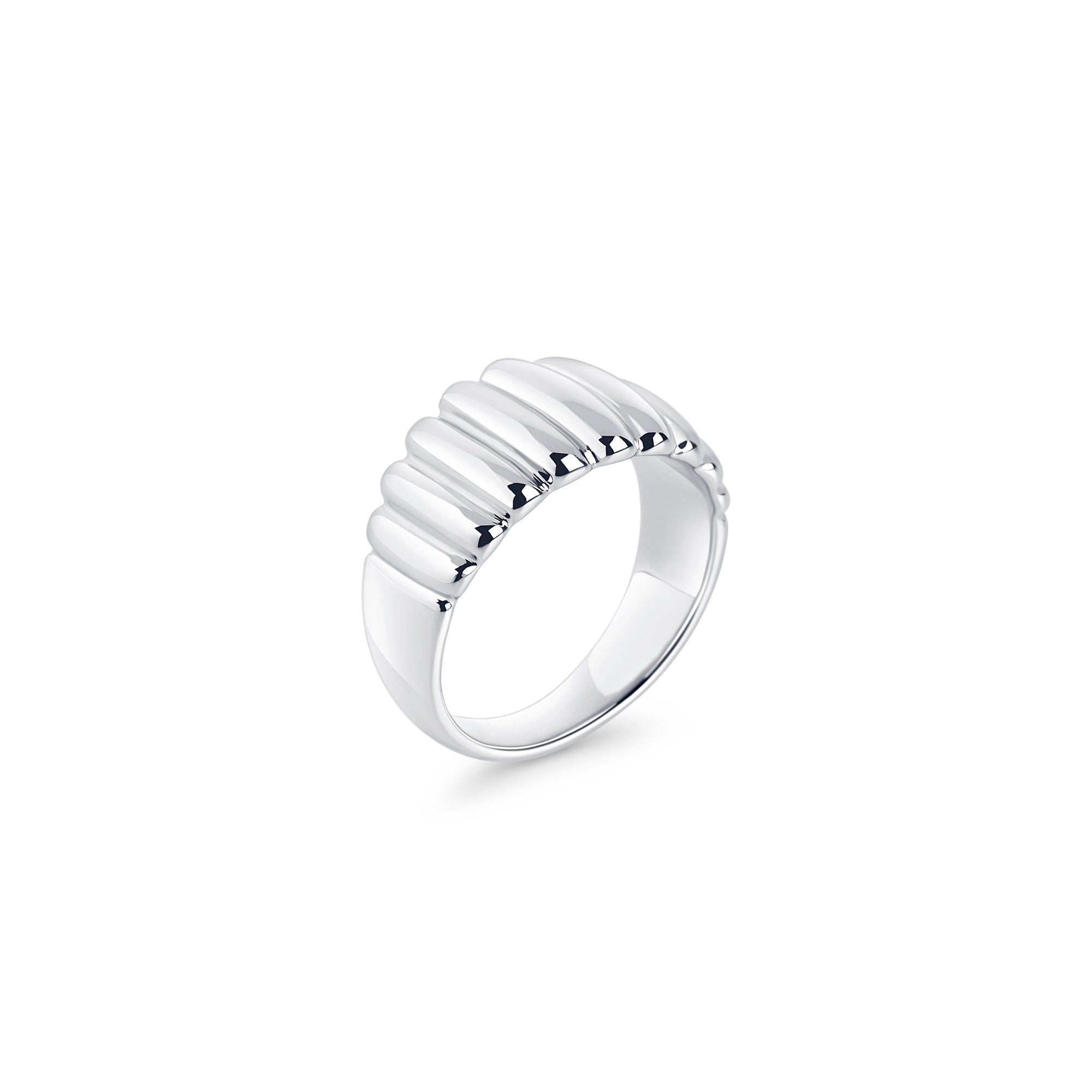 Gold stainless steel ribbed band ring, bold sculptural statement design, hypoallergenic non-tarnish durable jewelry, modern chunky fashion ring for everyday wear.
