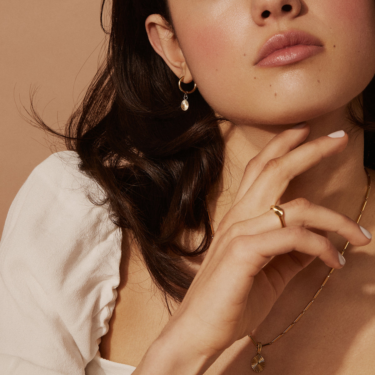 Gold Stainless steel hoop earrings with sun pendant comfortable MIA